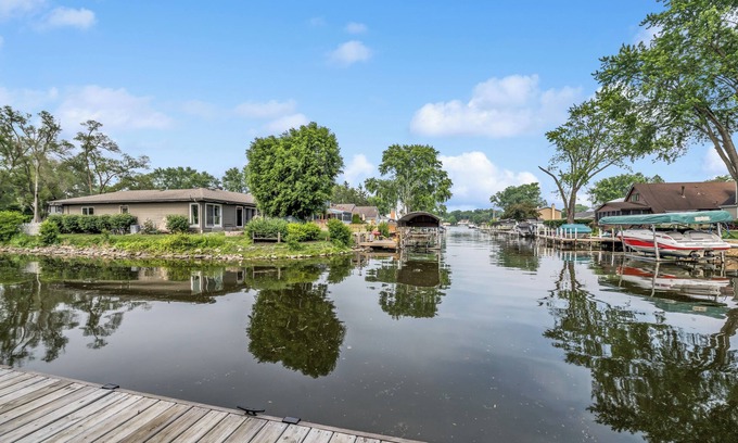 McHenry House | Peaceful and Relaxing Water Front Home with Outdoor Pool Sleeps 12