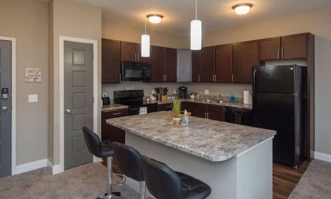West Des Moines Apartment | Peaceful Getaway-Pool Access, Attached Garage, Gym