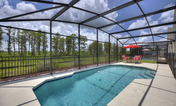 Sunset Ridge House | Peaceful Paradise Pool Home with King suite 10 minutes to Disney World