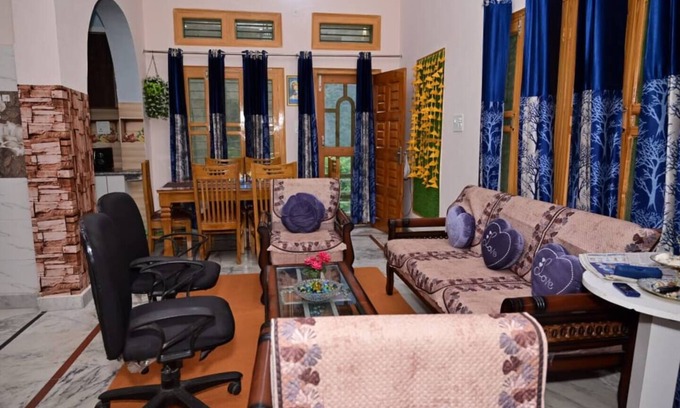 Rajgarhi House | Peaceful stay : 2-bedroom, bright living area, kitchen, terrace, and garden
