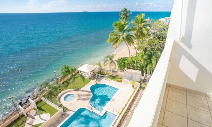 Stella Condo | Pelican Reef 703 Beachfront Penthouse with Ocean and Sunset Views