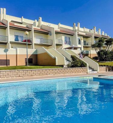 Sao Bernardino House | Peniche master bedroom with sea view balcony, private bathroom, shared kitchen, swimming pool, surfing resort