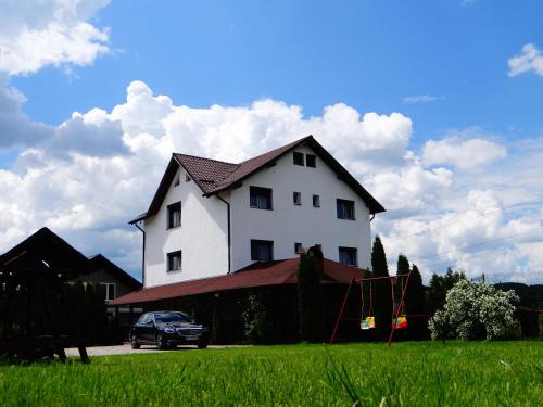 Albestii Paminteni House | Pensiunea Lacul Albesti