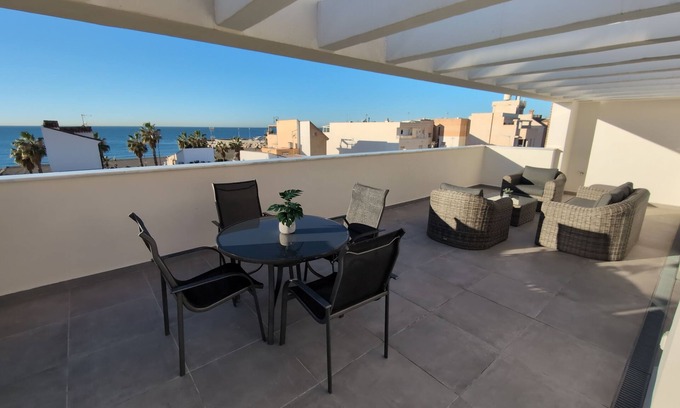 Caleta de Velez Apartment | Penthouse El Carmelo: New, modernly furnished with huge terrace, <50m from beach
