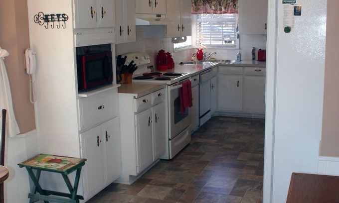 Wichita House | Perfectly located, east side w/fireplace, garage and fenced yard.