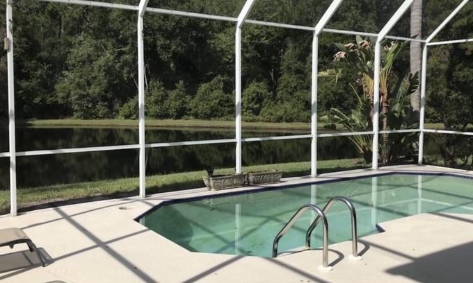 Coventry Village House | Perfectly placed by-beach & city 4 bd 2.5 b pool w pond & preserve view