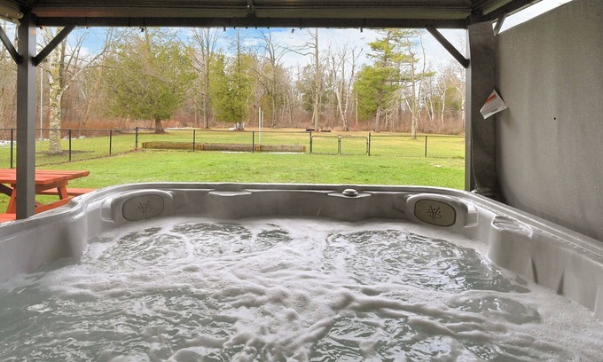 Lambton Shores House | Pet-Friendly Beach House with Hot Tub + Games Room + Enclosed Large Fence
