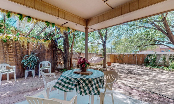 Taylor Ranch House | Piazza Di Coppice - A beautifully overgrown brick home!