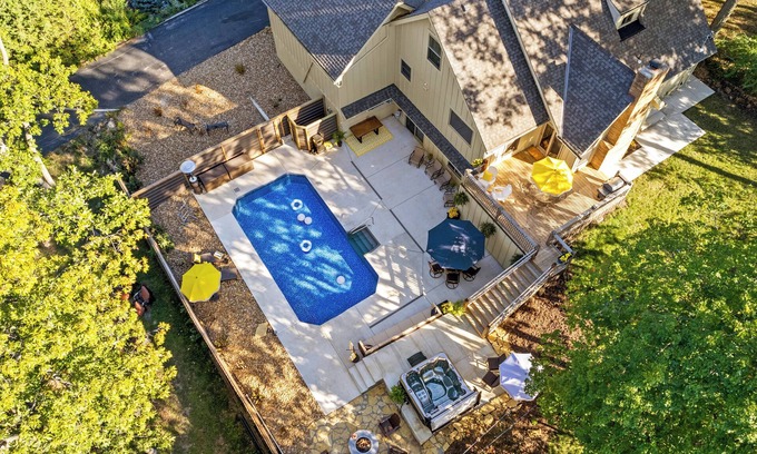 Merriam House | Pool & Hot Tub in the heart of KC! Tons of stylish space inside and out!