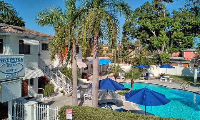 St. Pete Beach Condo | Pool view. Upstairs unit & workspace