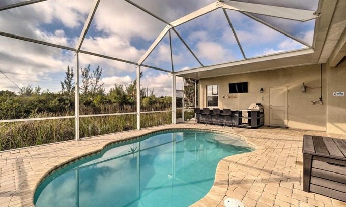 South Gulf Cove House | Port Charlotte Canalfront Home with Pool and Dry Bar!
