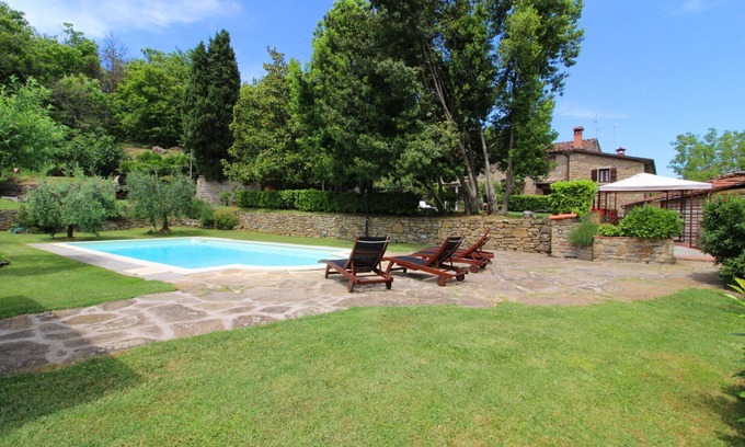 Castel Focognano Villa | Portion of an old stone country house, well-kept garden and private swimming pool. Situated a few km
