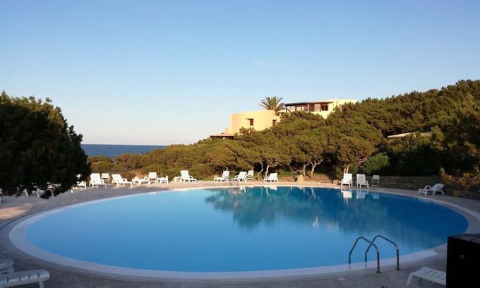 Porto Cervo Apartment | Porto Cervo, a stone's throw from the sea in a green residence with an elegant swimming pool