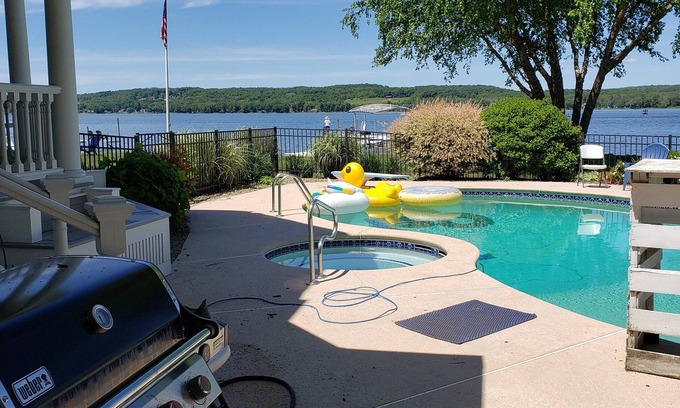 Lakewood House | Premier Home on Chautauqua Lake with beautiful covered deck, pool and dock.