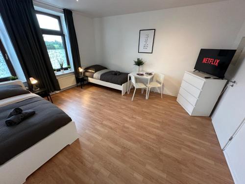 Lembruch Apartment | Premium Unterkunft für Monteure und Geschäftsreisende : Vollausgestattet, WIFI & Washing