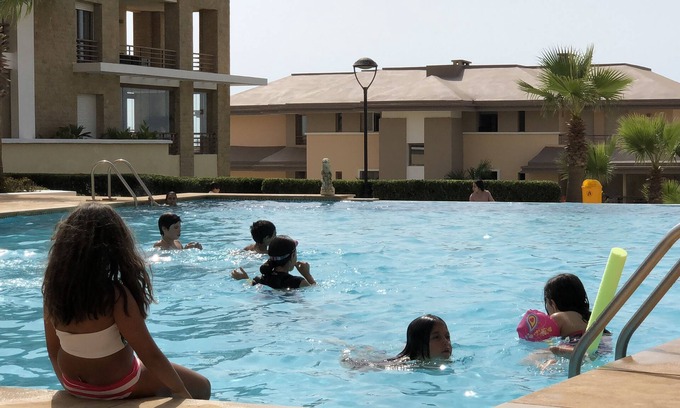 Plage des Nations Apartment | Prestigia plage des nations seen on sea and swimming pool high standing apartment