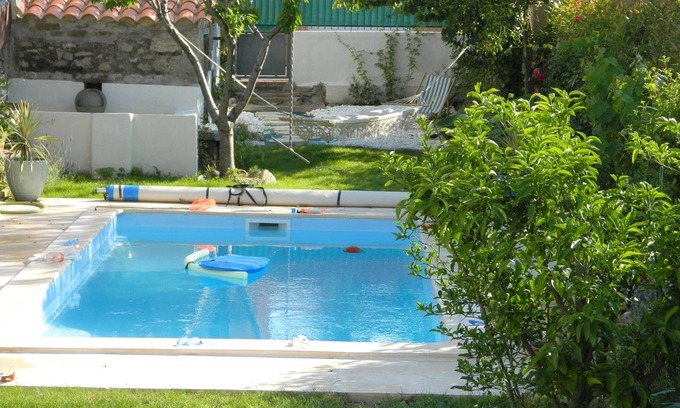 Saint-Genis House | Pretty village house with private heated pool. Opposite historic church.