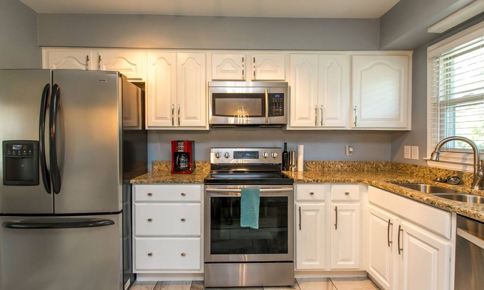 Lexington House | Prime Location: Ranch w/Basement, Covered Porch, & Great Yard!
