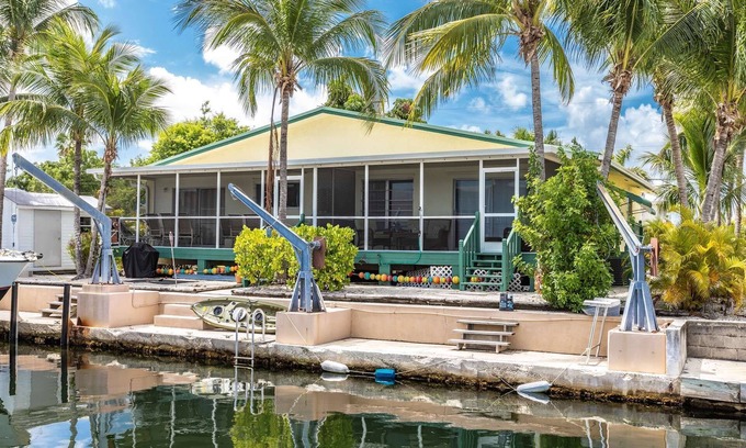 Pine Channel Estates House | Prime Time 2: Charming Canal Front Duplex, Your Gateway to South Pine Channel & Atlantic/Gulf Waters