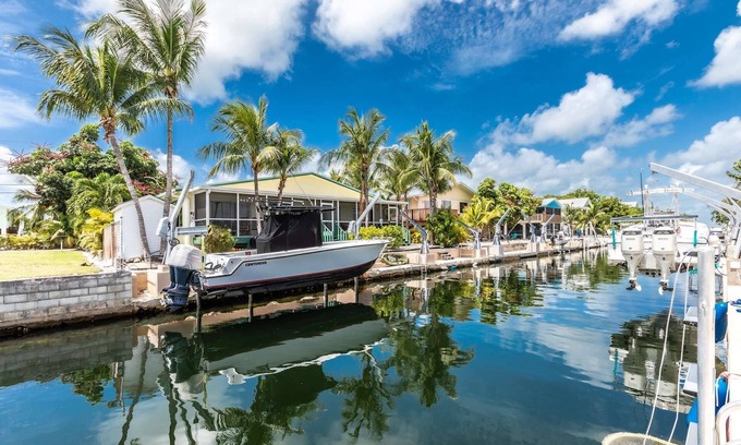 Pine Channel Estates House | Prime Time: A Tropical Paradise on Big Pine Key, Canal Front Duplex, Swift Access to Atlantic & Gulf
