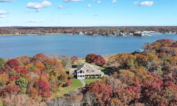 Mastic House | Private, 3-acre, waterfront escape w/pool, firepit, game rm & spectacular views
