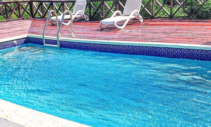 Dickenson Bay Villa | Private, beautiful 2-bedroom villa bursting with happiness and love