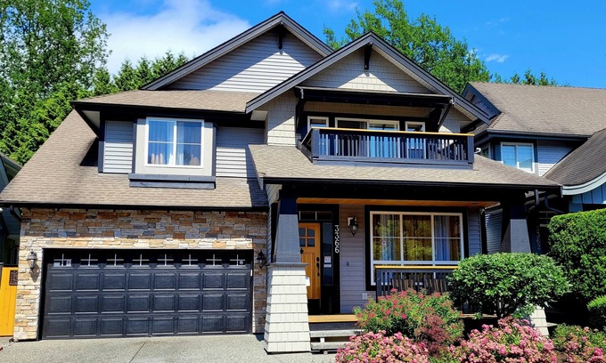 Surrey House | Private Bright Basement Suite