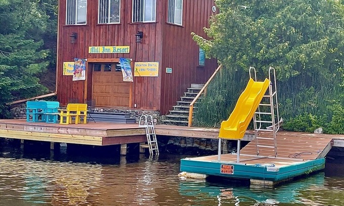 Hayward Cabin | PRIVATE CABIN ON CHIPPEWA FLOWAGE , MOORES BAY. TROPICAL ATMOSPHERE, 100 FT DOCK