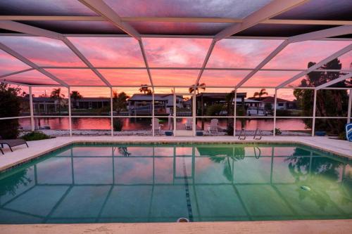 Apollo Beach House | Private Dock Heated Pool Hot Tub Game Room Fun