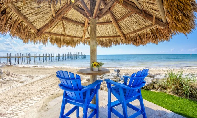 Marathon House | Private, Gated, Oceanfront, Beachfront 5-Star Estate with dock, putting green.