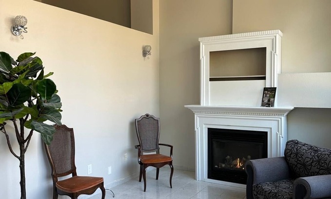 Mississauga Valleys House | Private home with large bedroom and spacious common areas with patio.