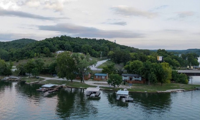 Camdenton House | Private Island Retreat with 500' Level Lakefront & 3 Houses with Private Docks!