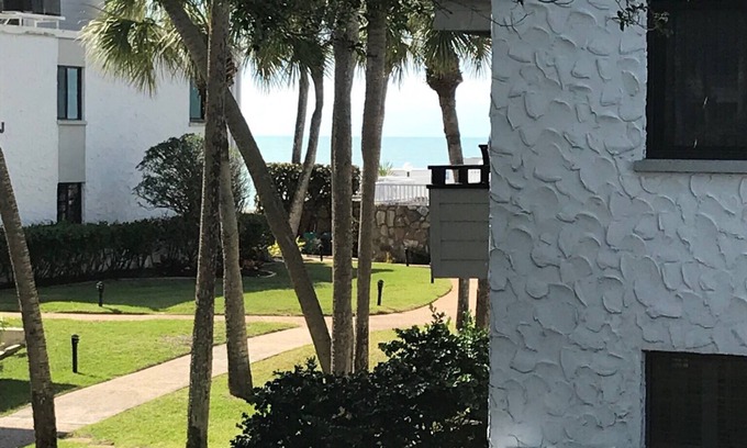 Venice Condo | Private Lanai overlooking Beautiful Garden just 100 Feet to Pool, Deck and Beach