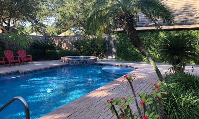 McAllen House | Private oasis in prime McAllen location with Gated Parking, Heated Pool & Spa