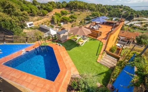 Pineda de Mar House | Pura Vida piscina barbacoa y vistas al mar