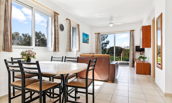 Paphos Apartment | Quality garden apt on the coast. Sea view Free Paphos airport transfers & aircon