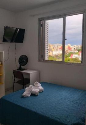 Cidade Baixa House | Quarto suite individual Compartilha somente a cozinha com o morador e sua cachorra Chori