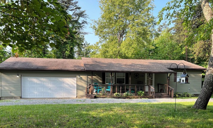 Wakefield House | Quiet & cozy retreat with firepit, front porch, back balcony, walk-in tub & more