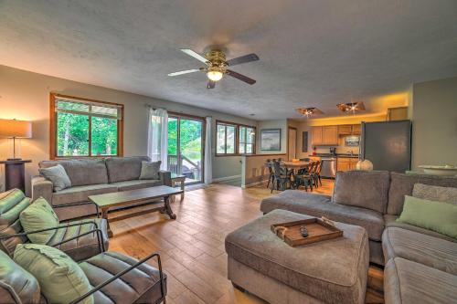Rapid City House | Rapid City Cottage with Deck quarter Mi to Torch Lake!