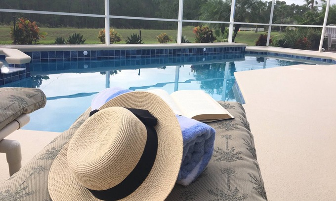 Tuscan Ridge House | RATES REDUCED Close to Disney. 5 Star home. Fantastic pool area, large lanai.