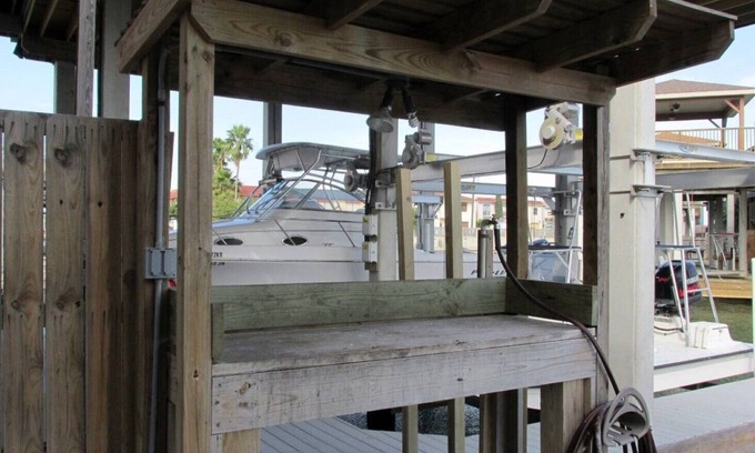 Port Mansfield Condo | Red Fish Condo B, with boat slips and pool.
