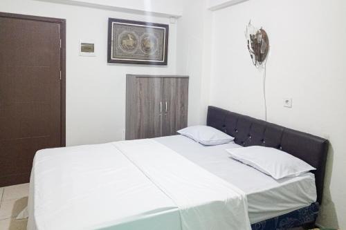 South Tangerang Apartment | RedLiving Apartemen LoftVilles City - Pelangi Rooms