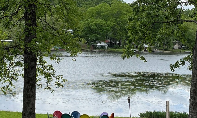 Warsaw House | Relax at Grandma’s house with a screened in porch overlooking a private lake!