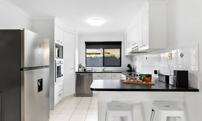 Urangan House | Relax at Moonstone Stunning Holiday Rental