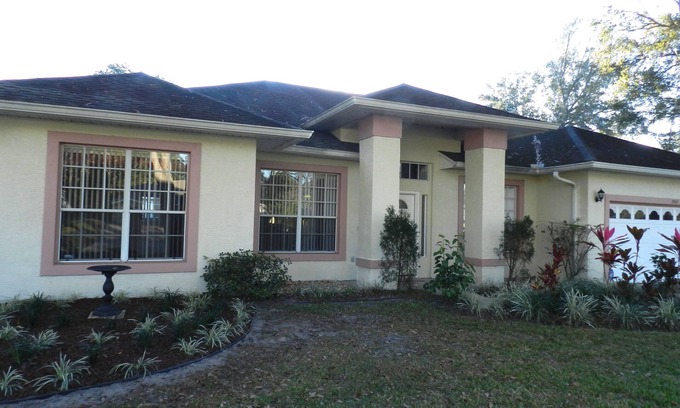 Doral Woods Villa | Relax in our hot tub at our 4 Bedroom, 3 Bathroom villa in Doral Woods