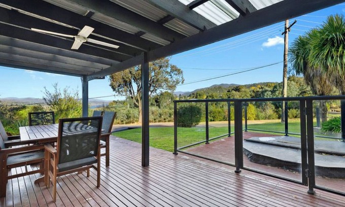 Goughs Bay House | Relax in the spa with views opposite Lake Eildon