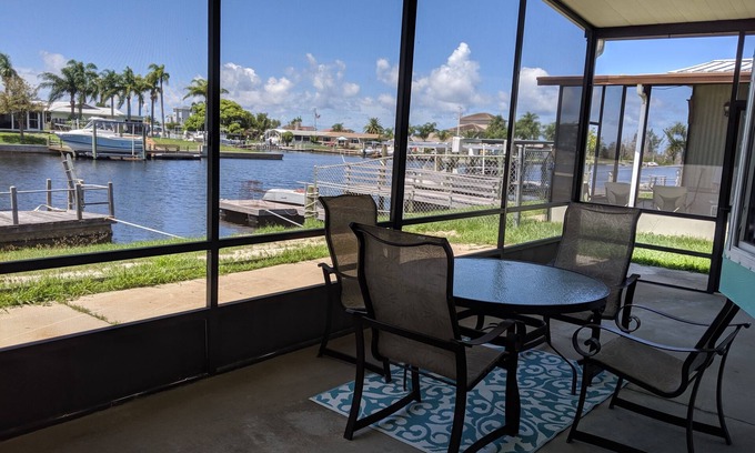 Port Richey House | Relax in your chair on the floating dock as the tide rolls in & catch a few fish