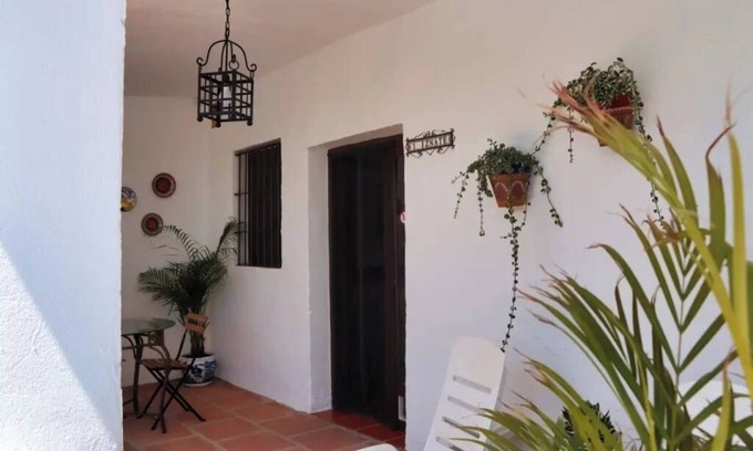 Benamocarra Apartment | Relax & Recharge: Studio Iznate with Pool View & Luxury Kitchen