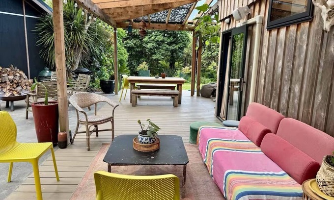 Raglan House | Relax & Unwind at Wainui Creek Retreat a private & tranquil home by the beach