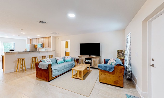 Port Malabar House | Relaxing home with patio, W/D, full kitchen, & Pack-N-Play - golf nearby